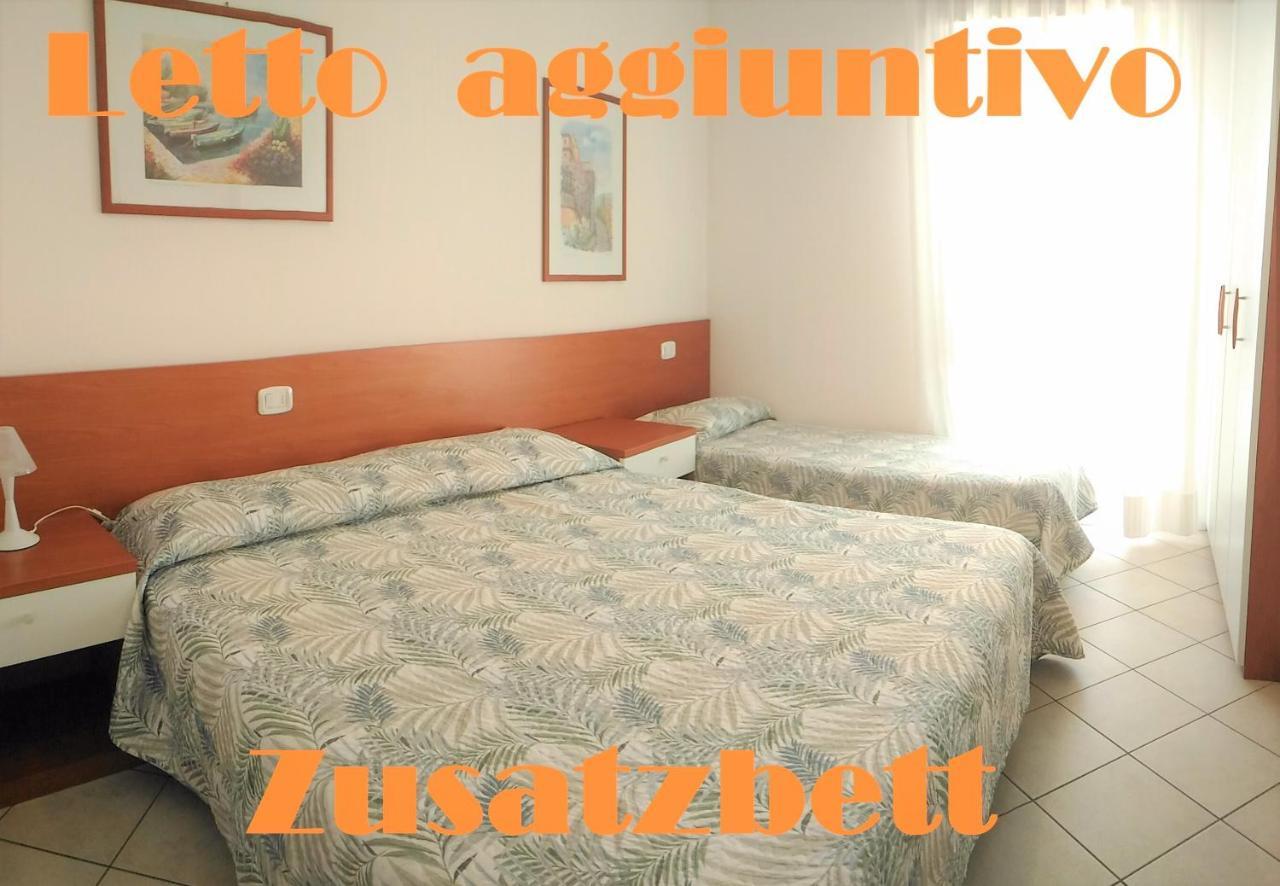 Green Holiday Wohnung Mit Schwimmbad Bibione Buitenkant foto